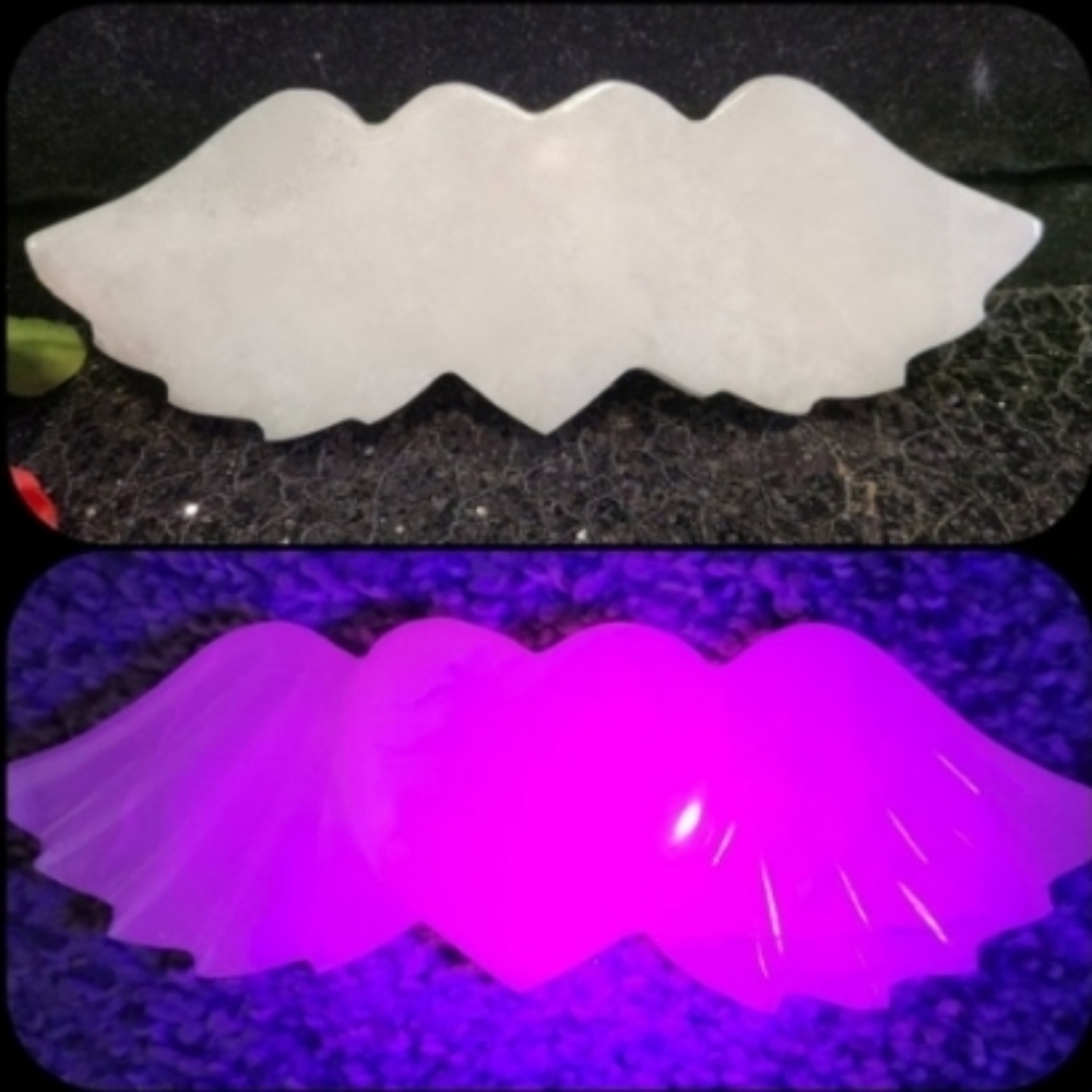 AAA Quality Pink Mongano  and white calcite uv reacted heart and wing carving.